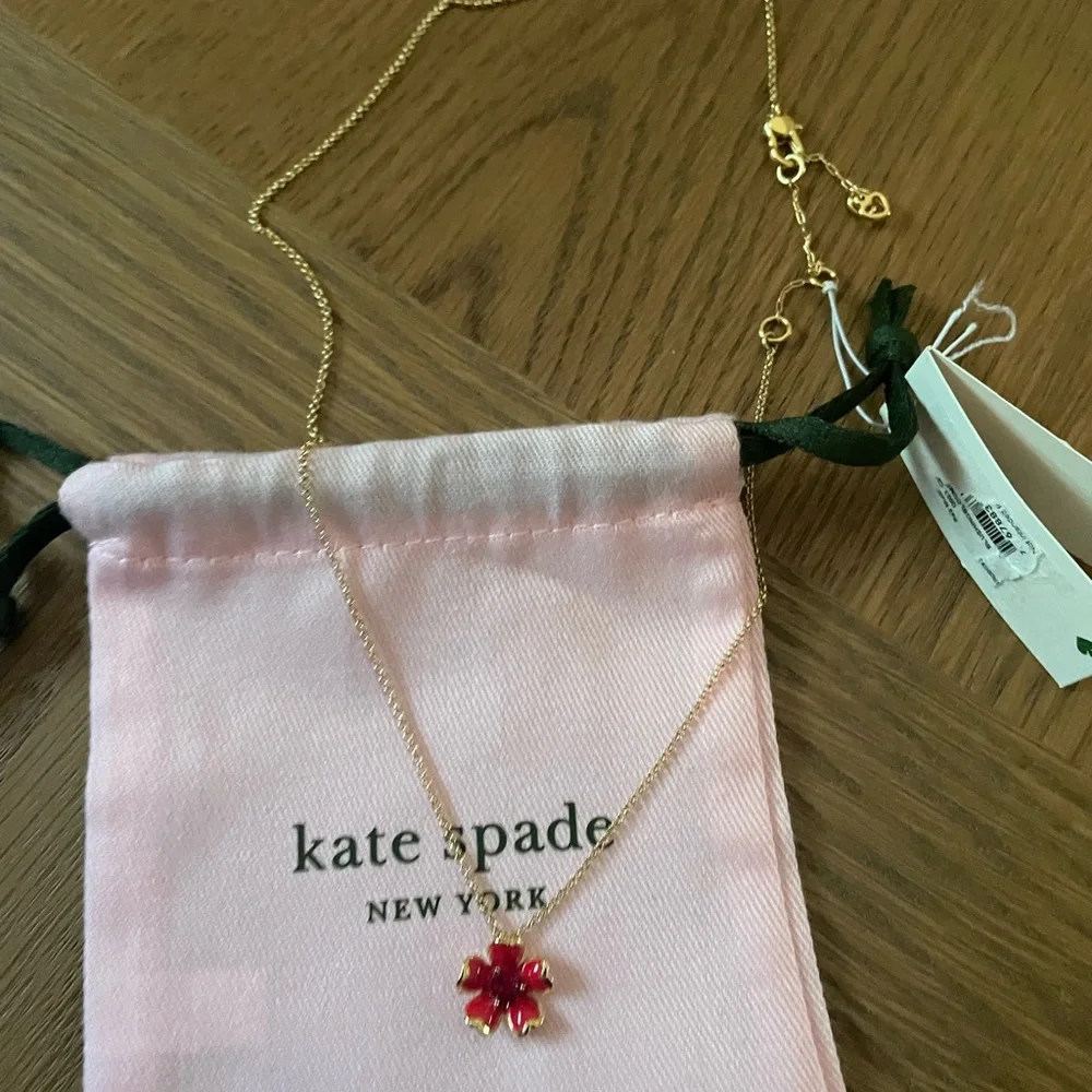 Kate spade NY Gold-Tone
Blushing Blooms Red Stone
Pendant Necklace - Picture 6 of 10